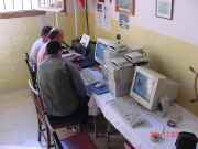 Ray, 9H1EI, on the station's e-log; Paul 9H5SP looks on.