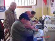 MARL CW master instructor Paul 9h1JT looks on as the boys work away QSOs.